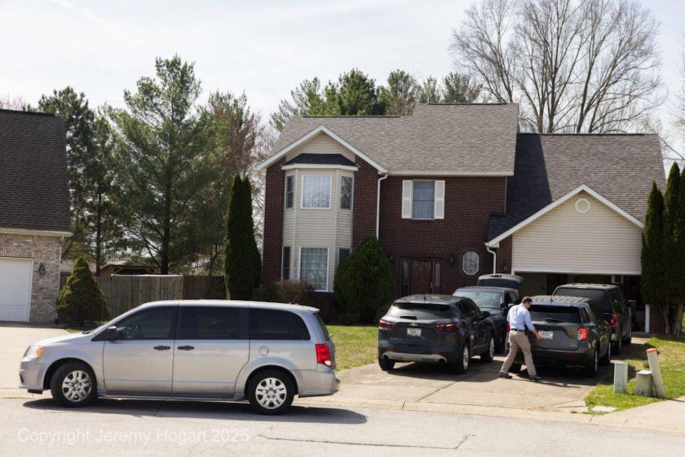 Agents search a Bloomington home belonging to an IU professor and IU Libraries analyst March 28, 2025, in Bloomington. The FBI declined to comment on the nature of the search