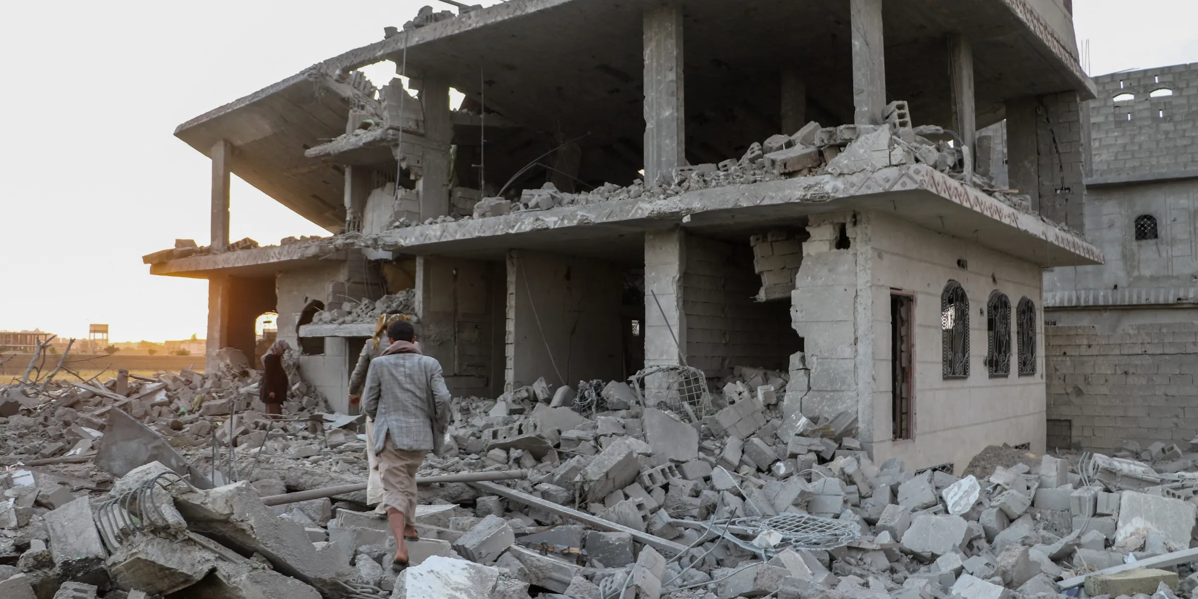 People inspect the rubble of a house hit by a U.S. strike on the weekend in Yemen’s northern Saada province on March 17, 2025