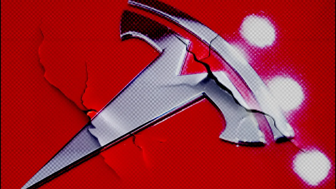 cracked Tesla emblem