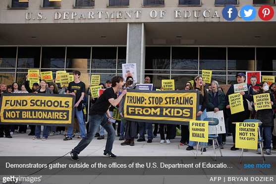 demonstrators outside U.S. Dept of Education