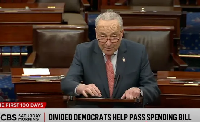 divided Democrats help pass spending bill