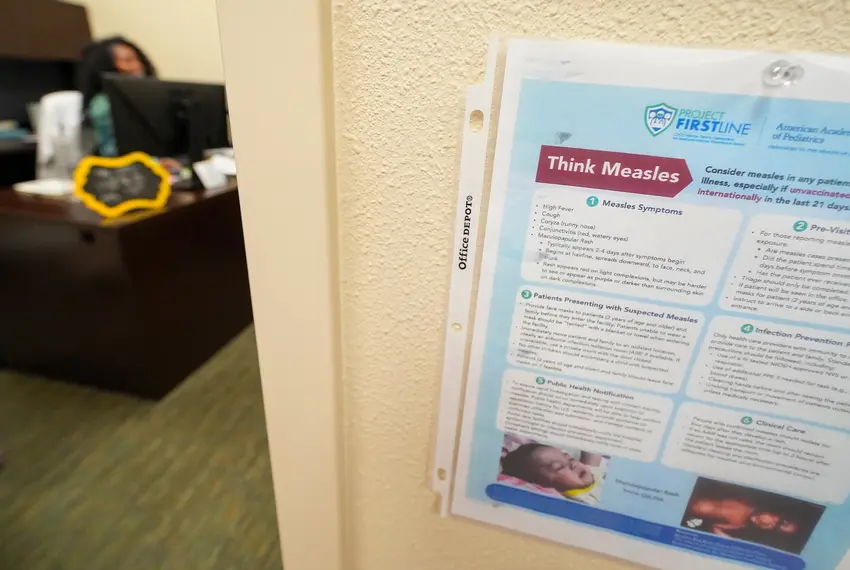 sign with measles information