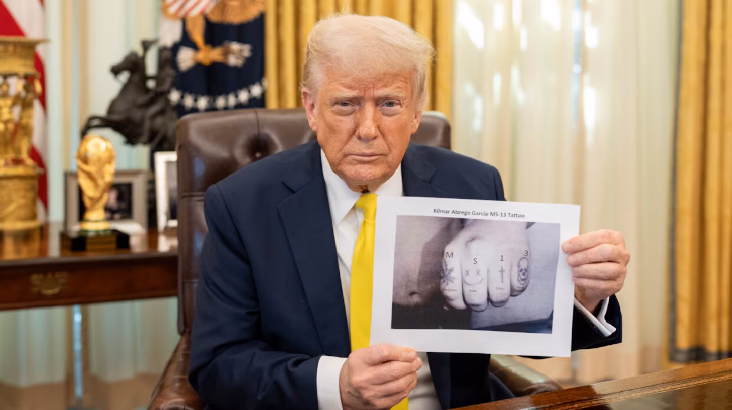 Donald Trump shared a photo with the letters and numbers 'M-S-1-3' digitally added above Kilmar Abrego Garcia's tattoos