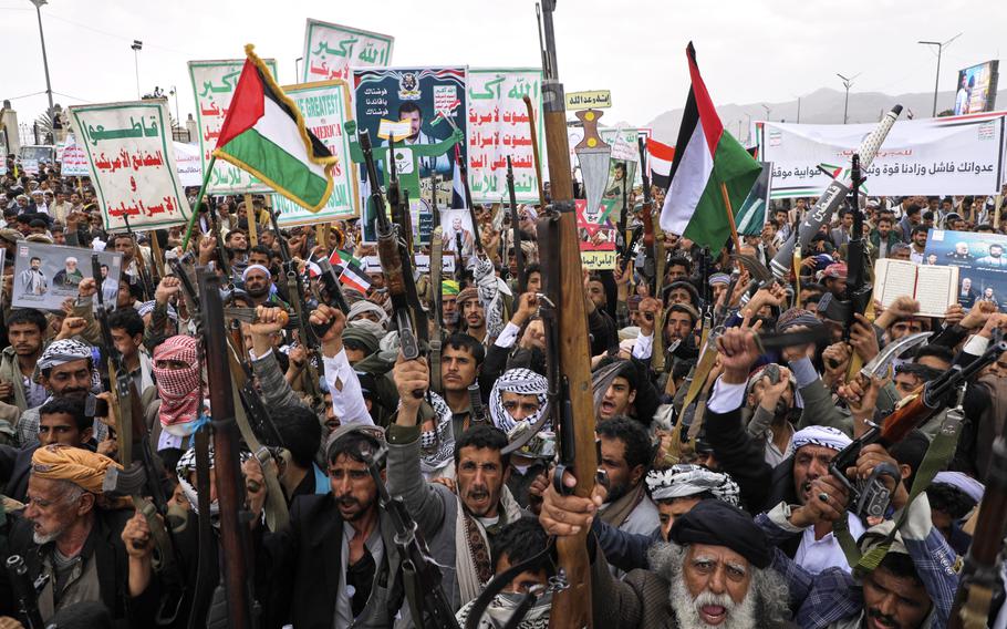 Houthi supporters chant slogans during a weekly, anti-U.S. and anti-Israel rally in Sanaa, Yemen, Friday, April 18, 2025