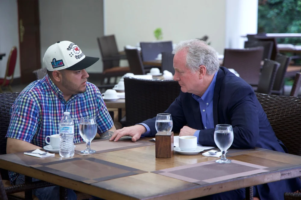 Sen. Chris Van Hollen, D-Md., meets with Kilmar Abrego Garcia, from left, in El Salvador, on Thursday