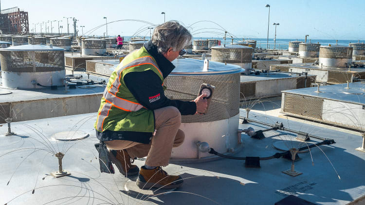Senior nuclear engineer Randall Granaas takes a radiation reading at the shuttered San Onofre Nuclear Generating Station south of San Clemente, California, In April 2022