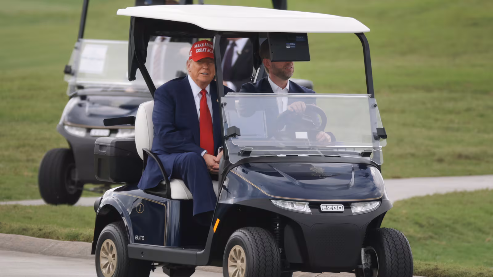 Trump in golf cart