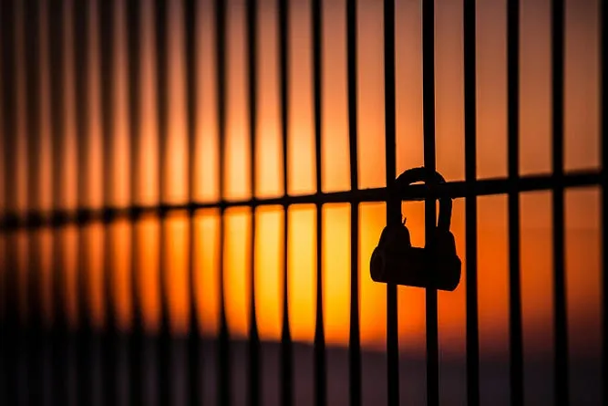 lock fence at sunset