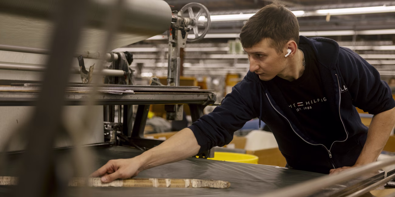 Dmytro Sierhiei of Ukraine is one of dozens of immigrants working at the Mills Manufacturing factory in North Carolina.