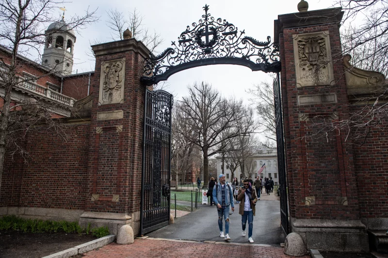 People walk through a gate as they exit Harvard Yard on the campus of Harvard University in Cambridge, Mass. Joseph Prezioso/AFP via Getty Images/AFP People walk through a gate as they exit Harvard Yard on the campus of Harvard University in Cambridge, Mass. Joseph Prezioso/AFP via Getty Images/AFP