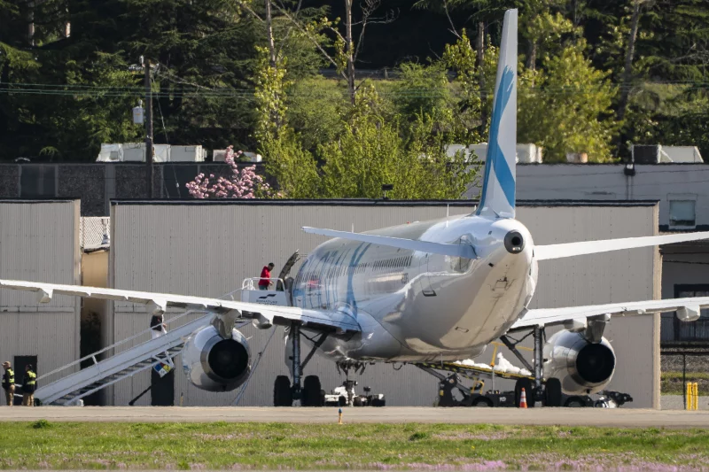 Detainees board a plane chartered by U.S. Immigration and Customs Enforcement (ICE) at King County International Airport on April 15, 2025 in Seattle, Washington. Semi-regular flights carrying detainees pass through the airport as the Trump administration continues to plan for the expansion of immigrant detention and deportation. David Ryder/Getty Images