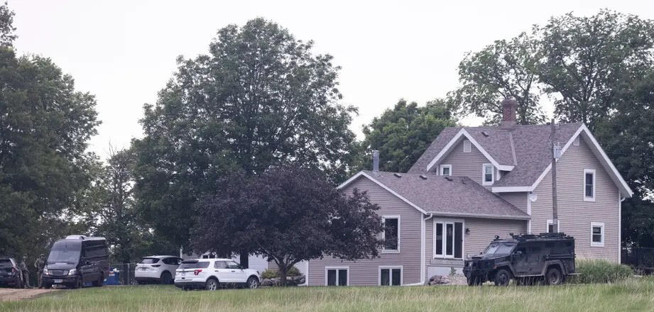 Law enforcement officers on the property of the suspect, Vance Boelter, in Green Isle, Minn., on Sunday.Credit...Tim Gruber for The New York Times Law enforcement officers on the property of the suspect, Vance Boelter, in Green Isle, Minn., on Sunday.Credit...Tim Gruber for The New York Times