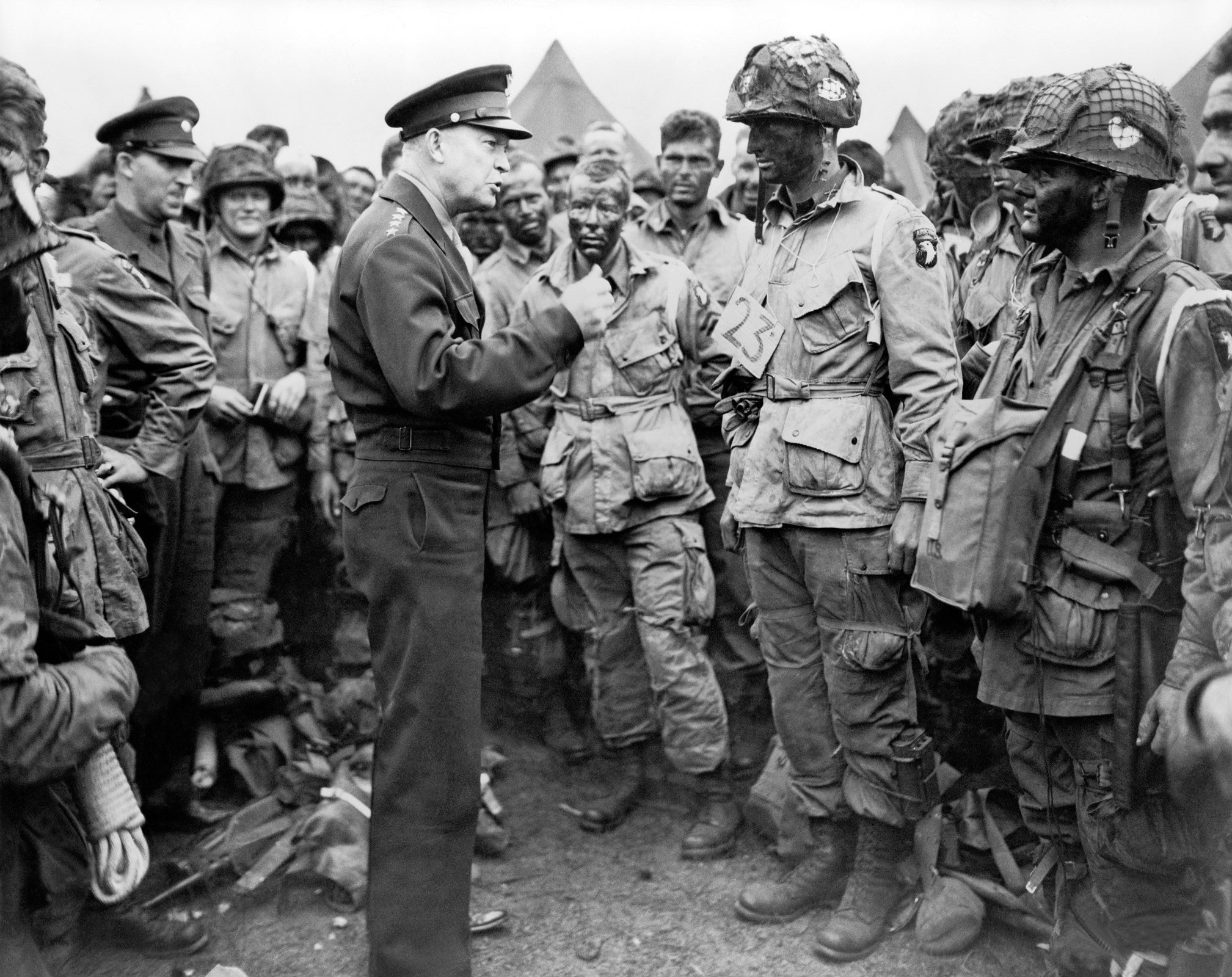 Then-Gen. Dwight D. Eisenhower talks with American paratroopers on the evening of June 5, 1944, as they prepared for the Invasion of Normandy. (Photo by Underwood Archives/Getty Images)