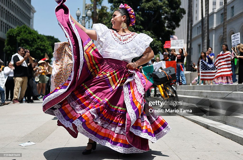 Dancers perform at a protest by mariachi and folklorico dancers outside City Hall, as protests against ICE immigration raids continue in the city, on June 11, 2025 in Los Angeles, California. Tensions in the city remain high with daily protests after the Trump administration called in the National Guard and the Marines against the wishes of Gov. Gavin Newsom and city leaders. (Photo by Mario Tama/Getty Images)