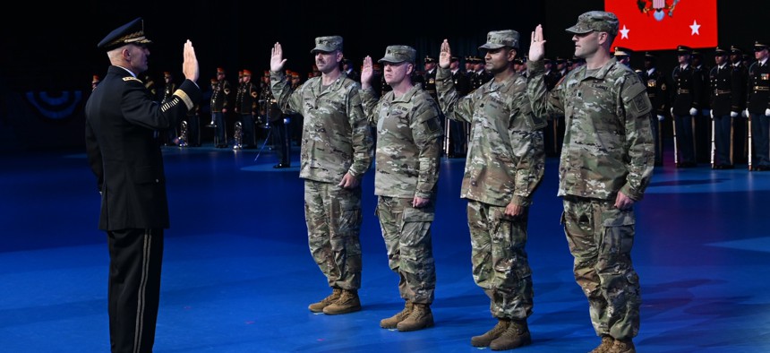 Army Chief Gen. Randy George administers the Oath of Office to four new U.S. Army lieutenant colonels during a Detachment 201: The Army’s Executive Innovation Corps commissioning ceremony at Joint Base Myer-Henderson Hall, Va., June 13, 2025. U.S. Army / Leroy Council