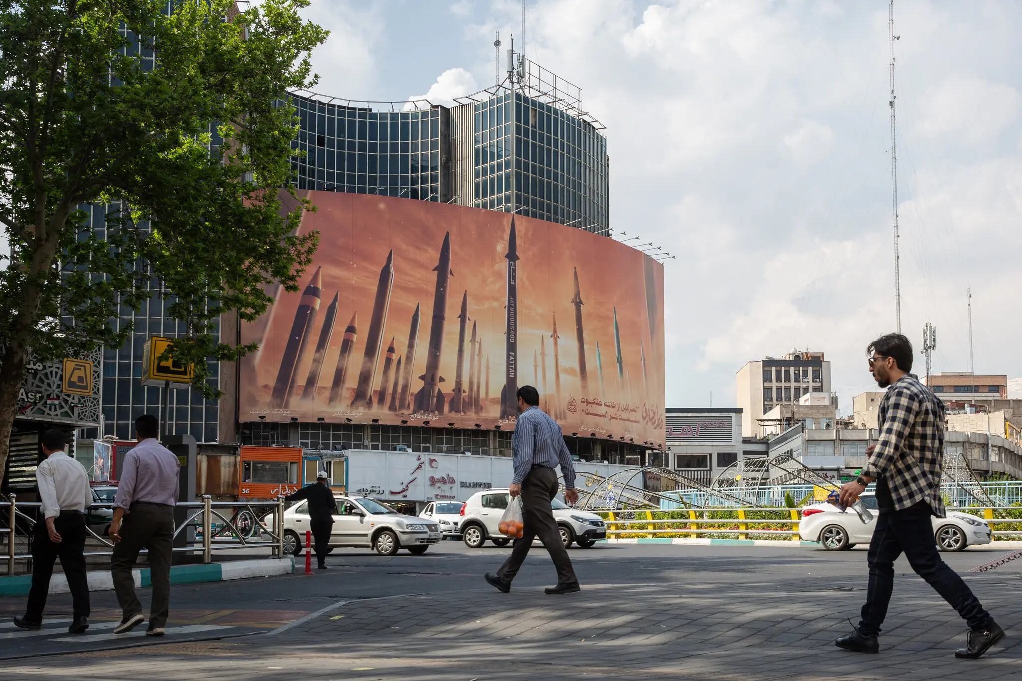 A billboard showing a variety of missiles in Tehran last year. Iran’s nuclear program has become ingrained in the country’s identity since it began in the late 1950s.Credit...Arash Khamooshi for The New York Times