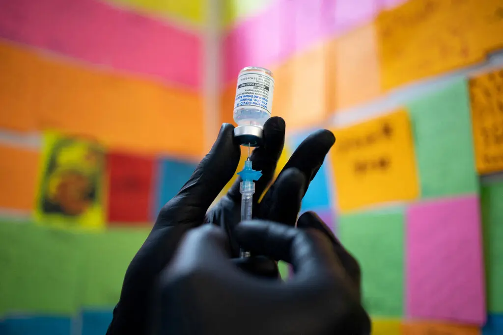 The changes to vaccine policy mean that doctors would have to write so-called off-label prescriptions for younger people who want protection from the coronavirus, which could be a barrier for some patients.Credit...Hannah Beier/Reuters