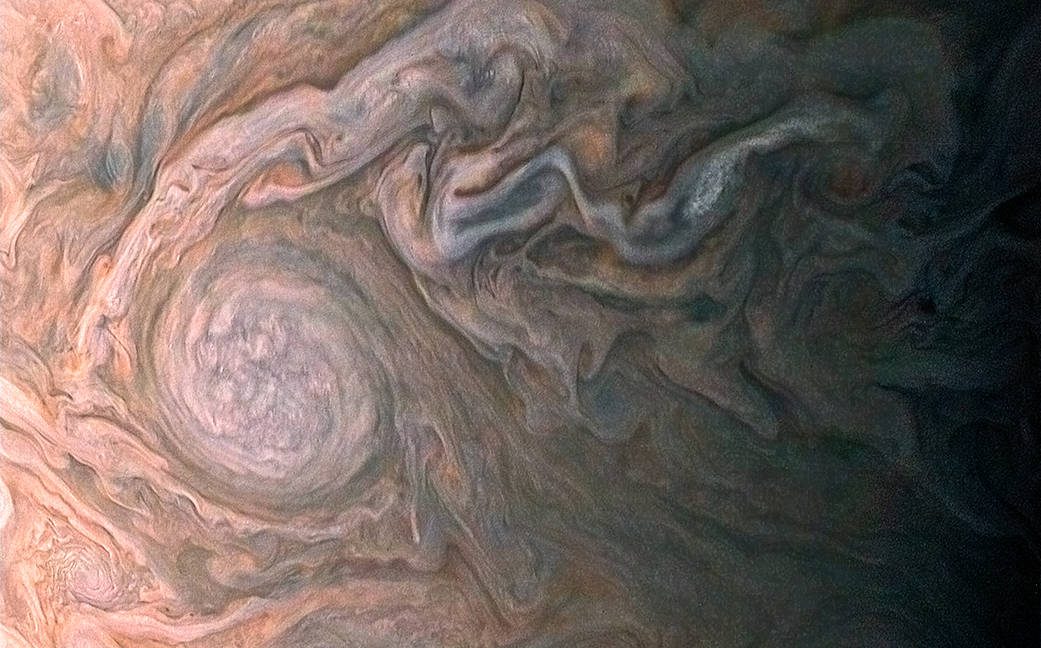 NASA’s Juno spacecraft skimmed the upper wisps of Jupiter’s atmosphere when JunoCam snapped this image from an altitude of about 14,500 km above the planet’s swirling cloud tops. Credit: NASA/JPL-Caltech/SwRI/MSSS/Roman Tkachenko