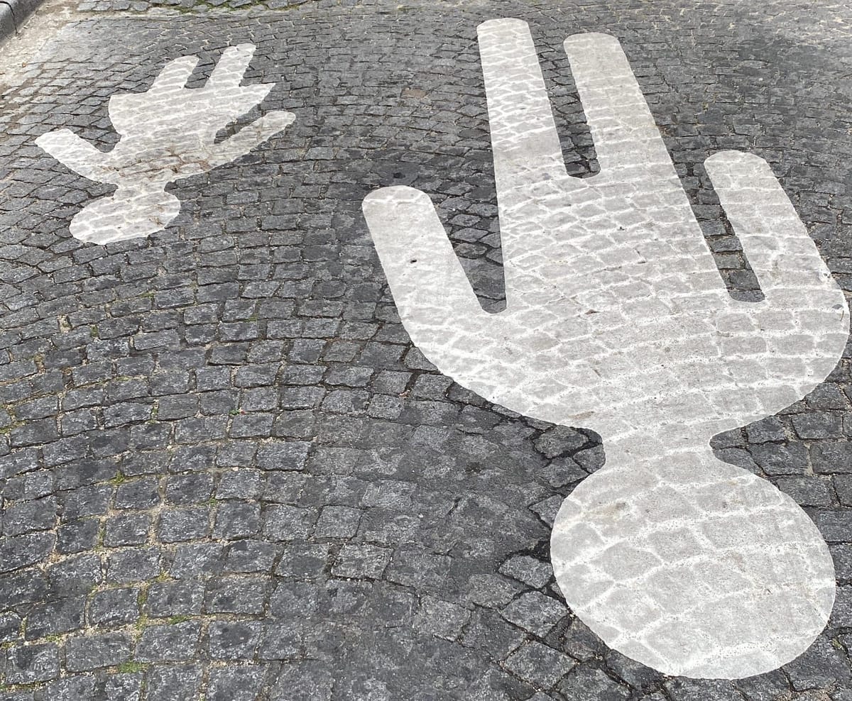 Pavement safety stencil, Paris, 2025. Pavement safety stencil, Paris, 2025.