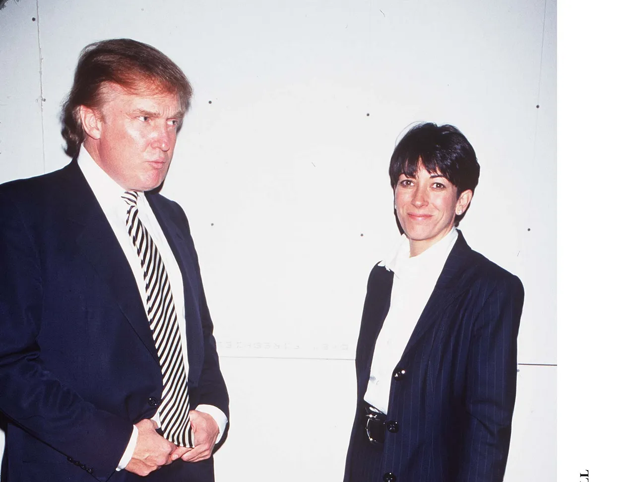 Trump and Ghislaine Maxwell in October 1997. (Arnaldo Magnani/Getty)