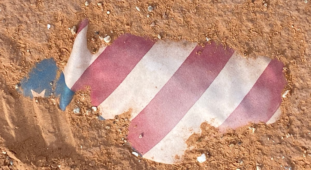 Buried flag, from the receding waters of Lake Powell/Glen Canyon. Buried flag, from the receding waters of Lake Powell/Glen Canyon.