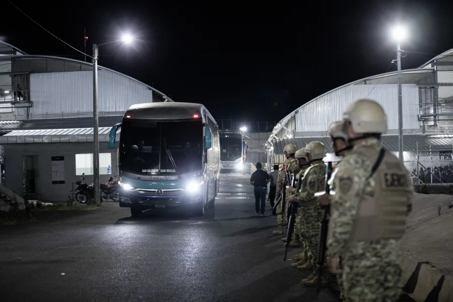 Venezuelan migrants accused by the U.S. of belonging to the Tren de Aragua criminal gang are seen being transferred from the Terrorism Confinement Center (Cecot) in El Salvador before being repatriated to Caracas on July 18, 2025 in La Paz, El Salvador. El Salvador Press Presidency Office/Anadolu via Getty Images