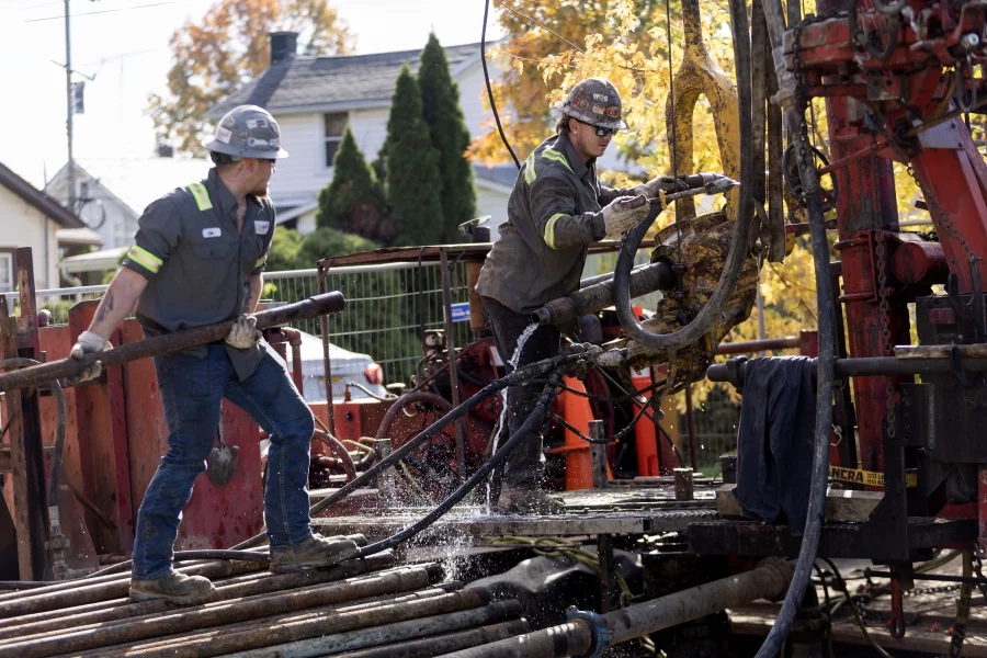A crew with the company CSR Services works on plugging an orphan well on a homeowner's property in Ashland, Ohio, on October 24, 2024. Maddie McGarvey for NPR