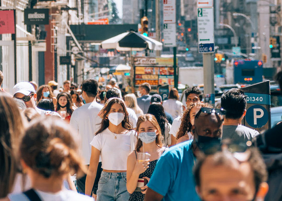 Pictured: COVID-19 times. There were many smart things we did during the pandemic, wearing masks outside was not one of them. Photo by Yoav Aziz on Unsplash