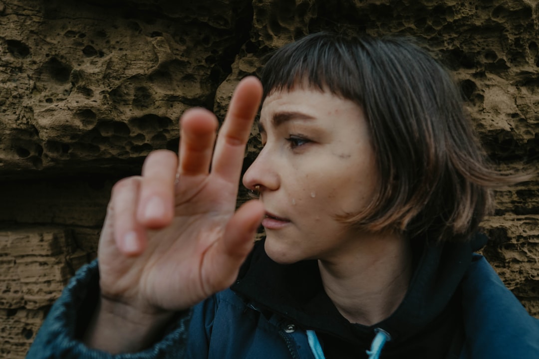 woman in blue zip jacket (Photo by Beniamin Şinca on Unsplash)