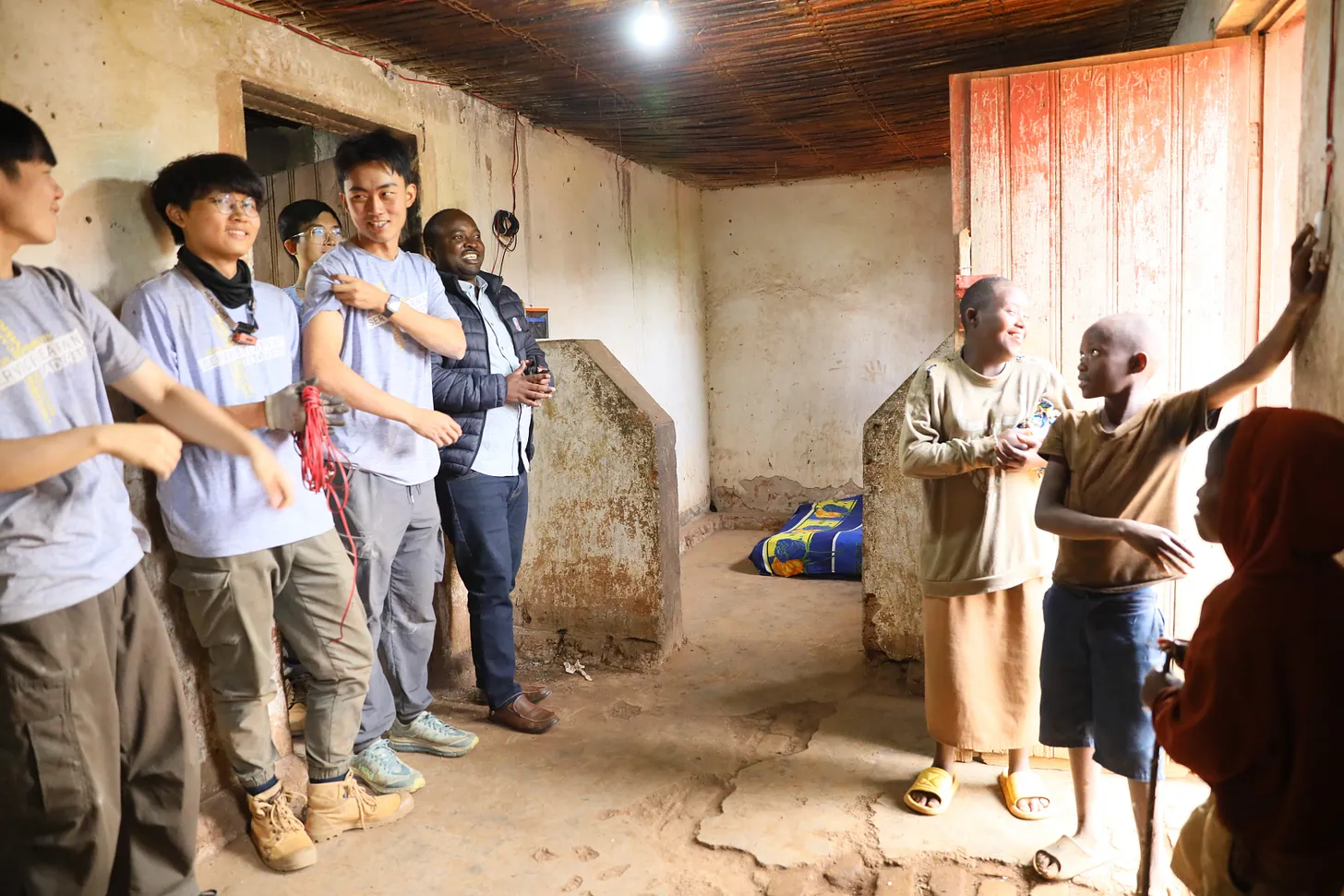 Chinese students helping install solar panels near Kigali in Rwanda last month