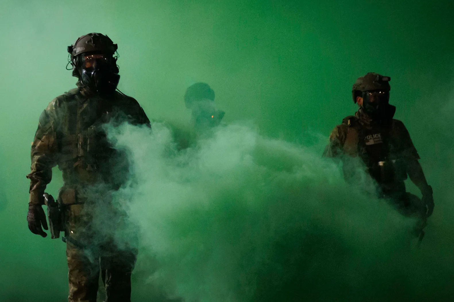Department of Homeland Security police deploy gas against demonstrators near Portland’s ICE facility. Department of Homeland Security police deploy gas against demonstrators near Portland’s ICE facility.