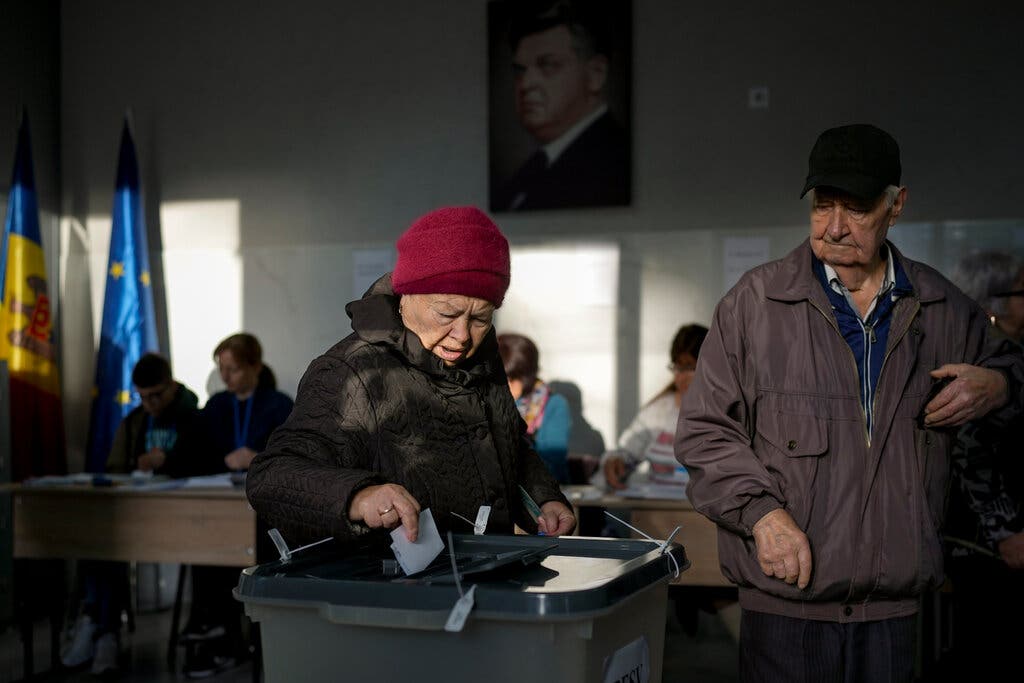 Voting in Chisinau, Moldova, during a presidential election runoff last year. The country will hold parliamentary elections at the end of the month.Credit...Vadim Ghirda/Associated Press
