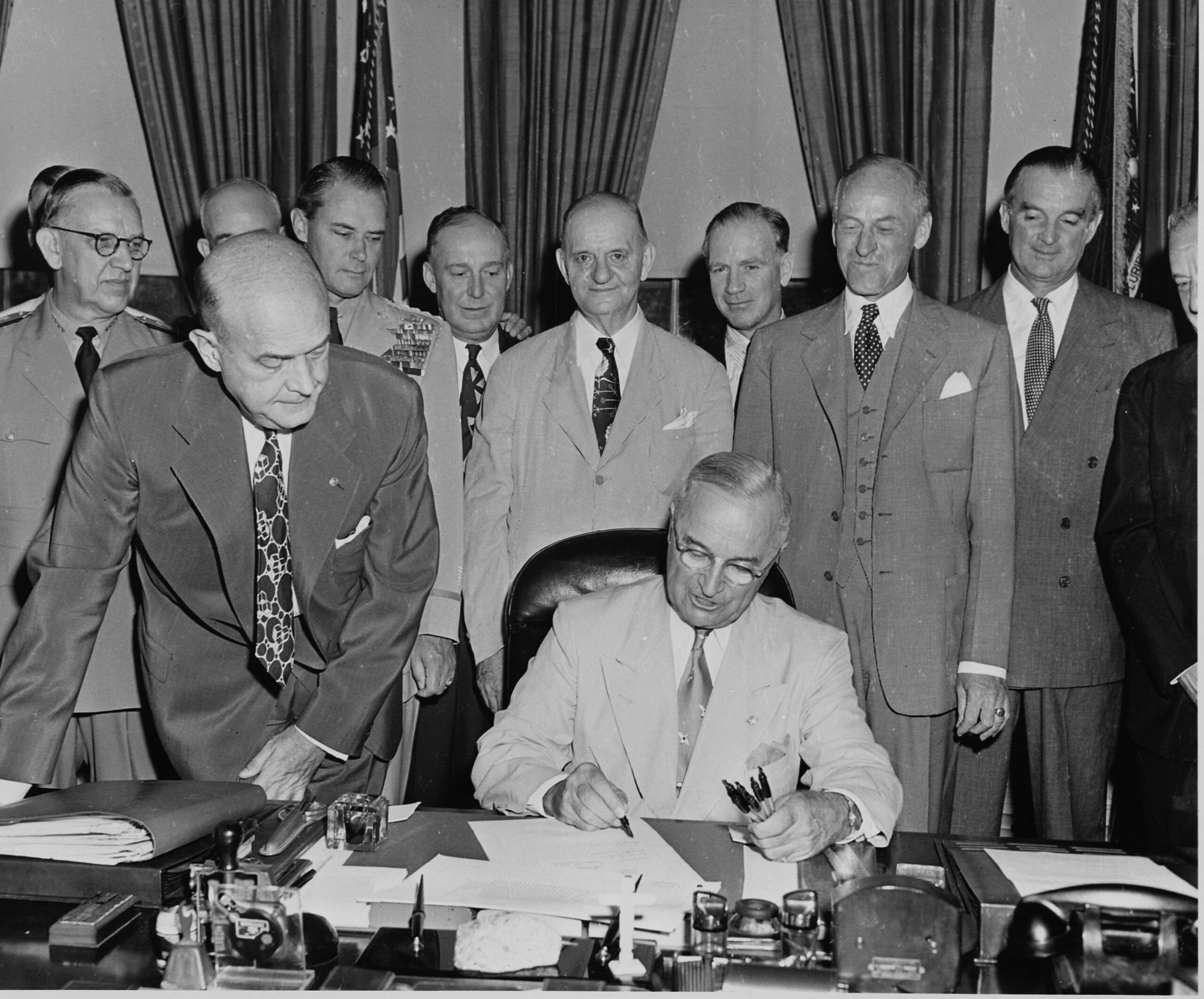 Truman signing