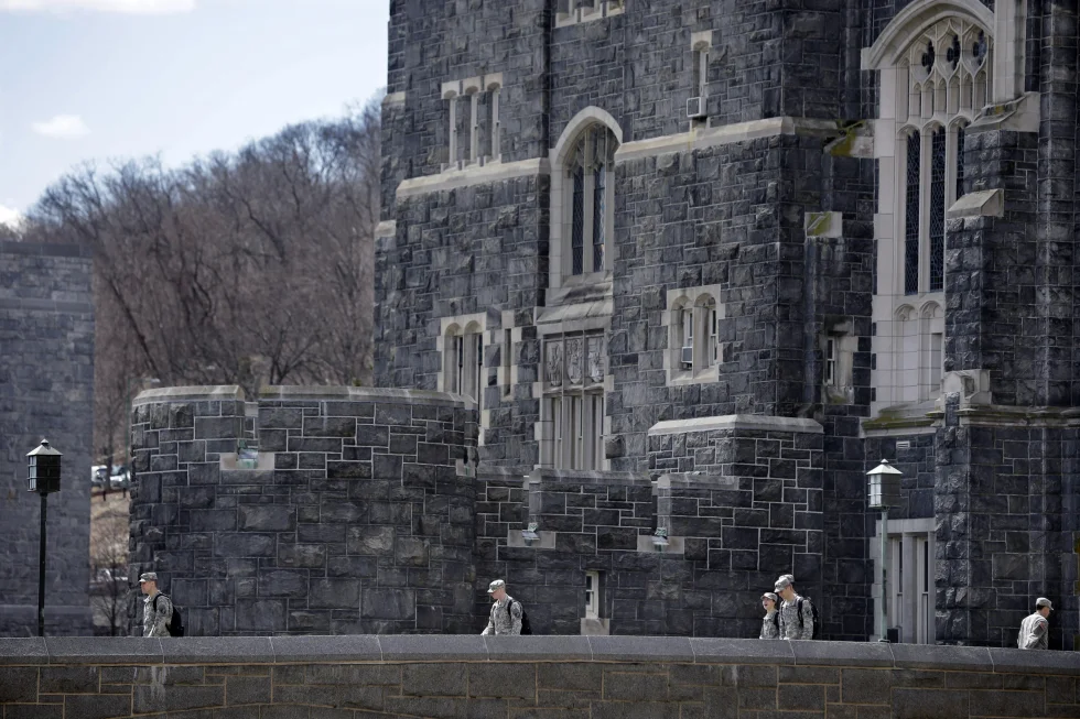 West Point cadets walk on campus during lunchtime break at the United States Military Academy in West Point, N.Y., April 9, 2014. (AP Photo/Mel Evans, File)