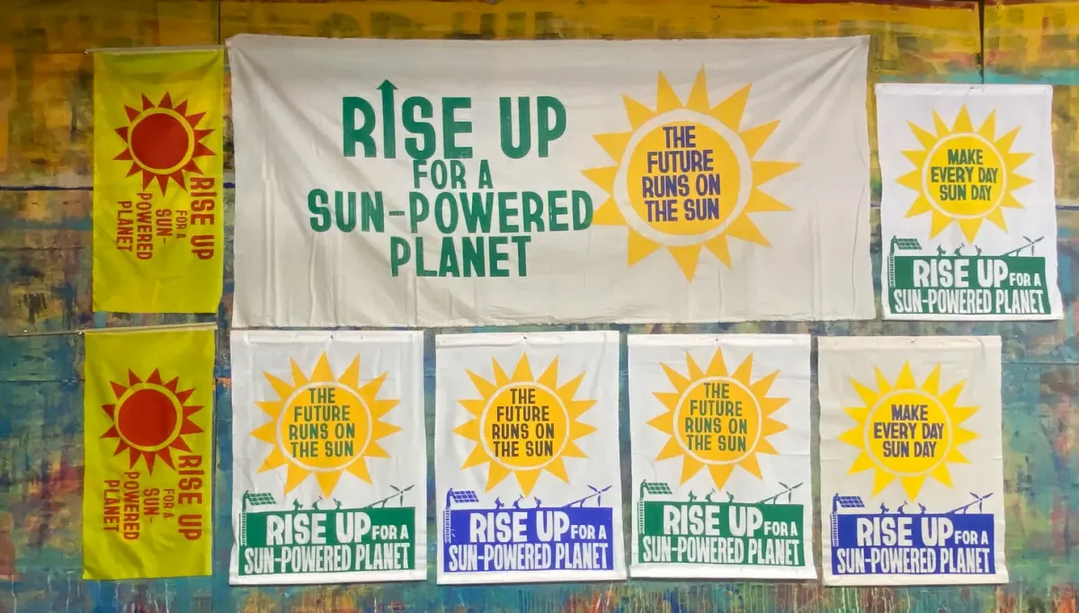 David Solnit's workshop is putting together signs for the pro-solar demonstrations Sunday (which is also Sun Day).