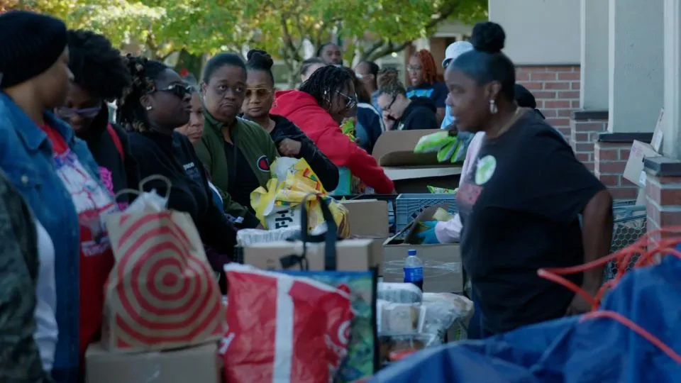A line forms at a DC-area food bank on October 21, 2025. - CNN