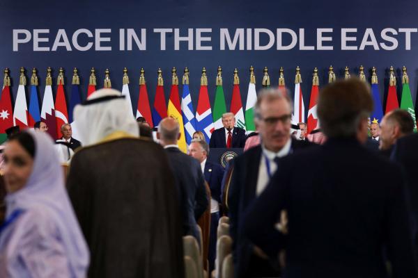 U.S. President Donald Trump looks on from the lectern during remarks following the official signing of the first phase of the Gaza ceasefire agreement between Israel and Hamas, during a world leaders' summit on ending the Gaza war, in Sharm El-Sheikh, Egypt, Oct. 13, 2025. Credit: Reuters/Evelyn Hockstein.