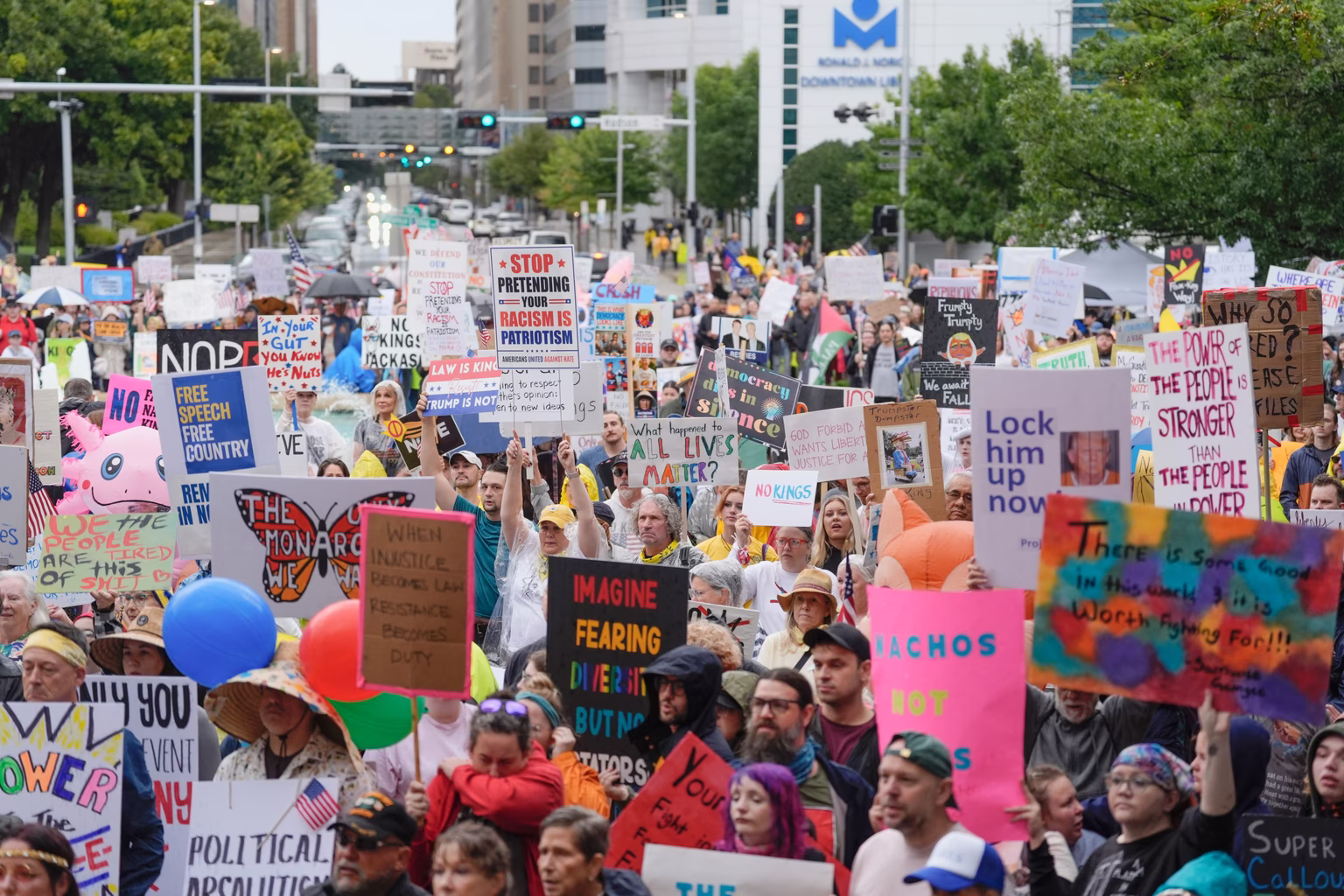 People in Oklahoma City gather for the “No Kings” protest on October 18, 2025, at City Hall Park.