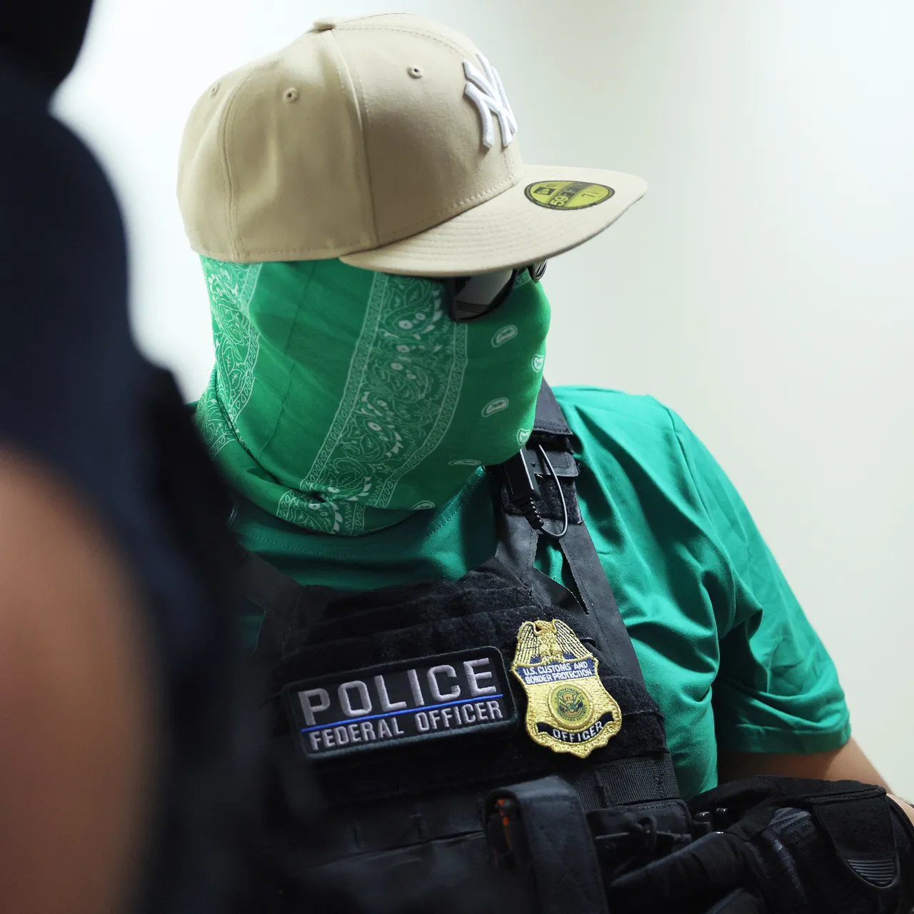 masked Federal officer