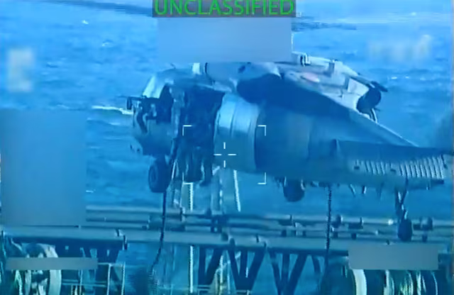 U.S. forces abseil onto an oil tanker during a raid described by U.S. Attorney General Pam Bondi as its seizure by the United States off the coast of Venezuela, December 10, 2025, in a still image from video. U.S. Attorney General/Handout via REUTERS