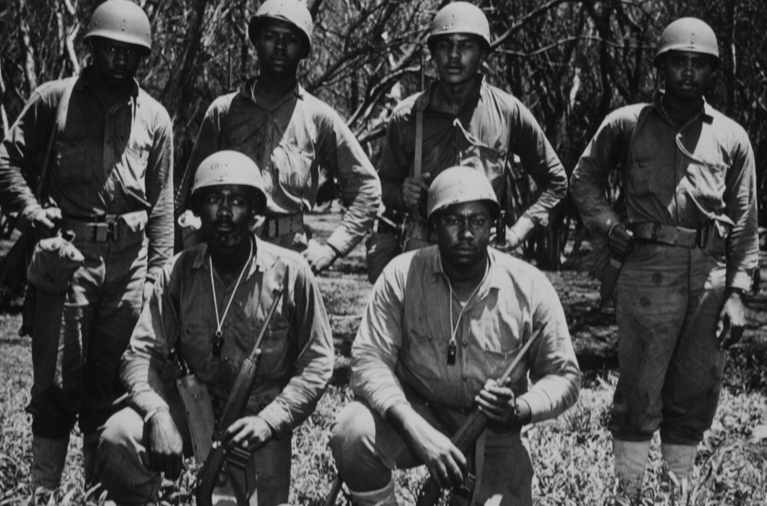 Leading petty officers of one of the Navy’s new Logistics Support Companies (American Coxswain Raymond C Vaultz, American Boatswain Mate Second Class James W Chase, American Coxswain John D Perry, American Coxswain Elmer Williams, American Coxswain Darrel M Beech, and American Coxswain Jimmie Cook) during combat training by Service Forces Advance Base Section at a station on Oahu Island, Hawaii, 10th May 1945. The officers are being trained prior to their departure for duty in a combat area. (Photo by Archive Photos/Getty Images)