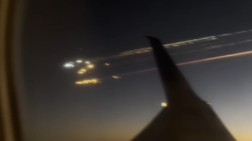 Debris from a SpaceX rocket ship explosion, recorded from a commercial flight in January. CREDIT: Bob Beresh