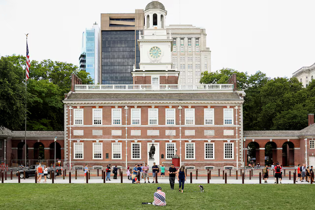 People spend time at Independence National Historical Park in Philadelphia, Pennsylvania, U.S., July 4, 2021. REUTERS/Hannah Beier/File Photo