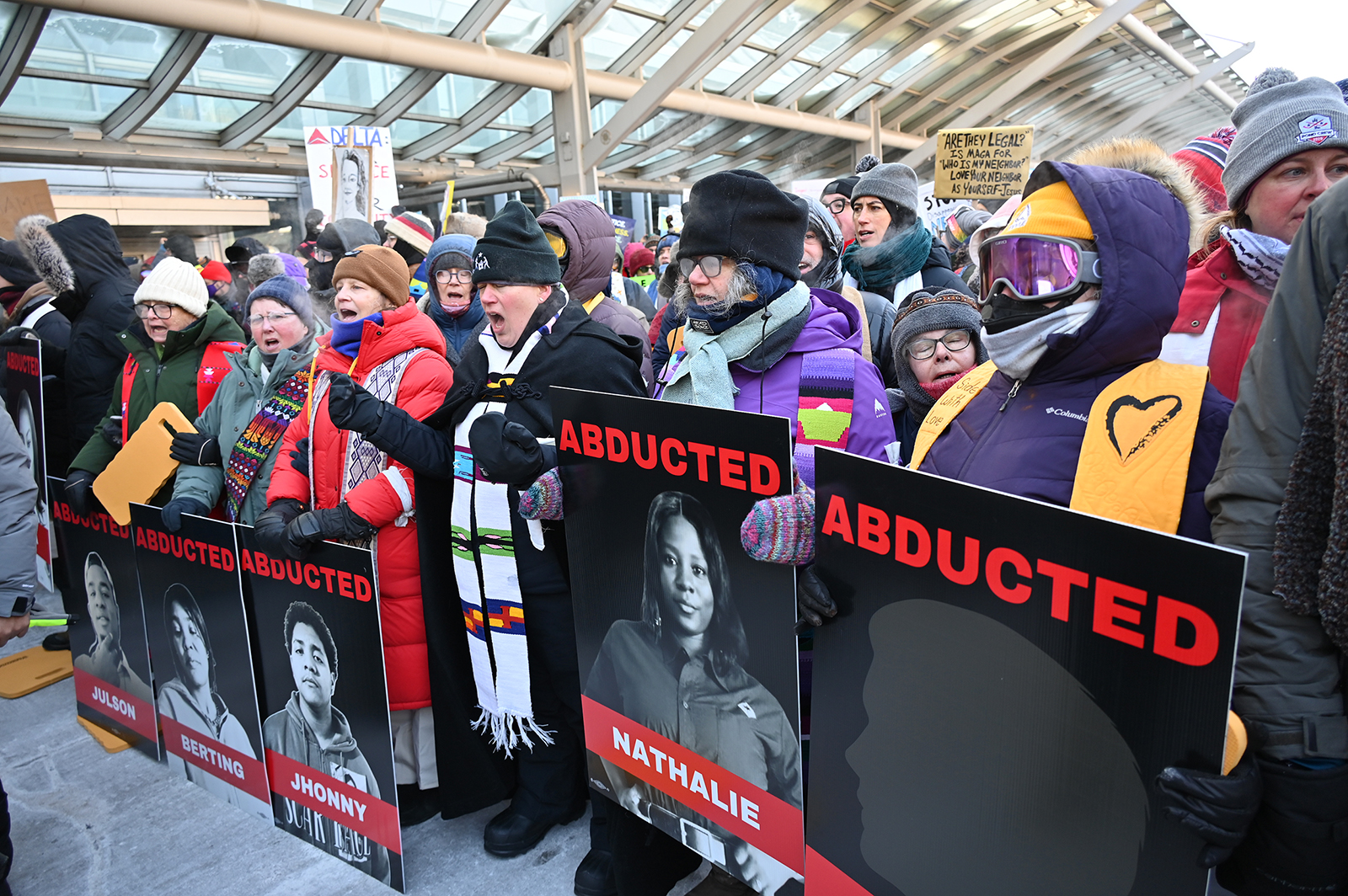 Clergy members lead a demonstration against ICE tactics in the departures area of Terminal 1 of the Minneapolis–Saint Paul International Airport, Friday, Jan. 23, 2026, in St. Paul, Minn. (RNS photo/Jack Jenkins)
