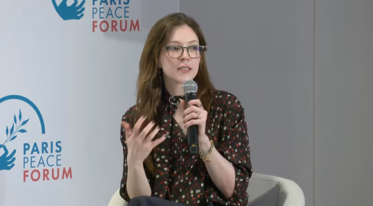 Ryan Beiermeister speaking on a panel about artificial intelligence at the Paris Peace Forum. Uncredited