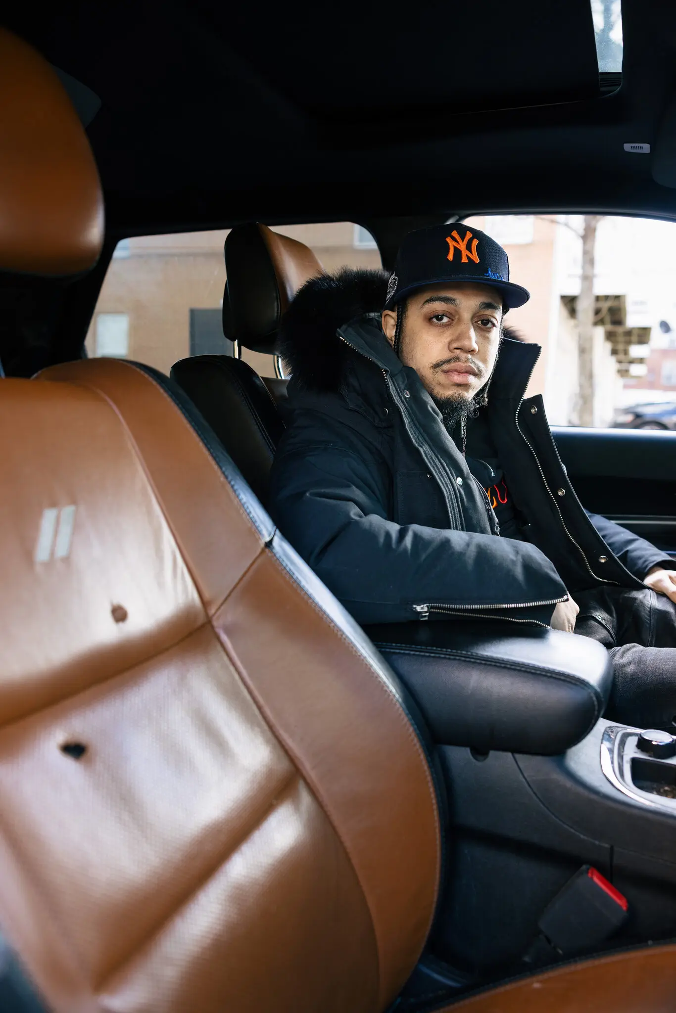 Phillip Brown was charged with a felony after ICE agents shot at his car in Washington last year.Credit...Alyssa Schukar for The New York Times