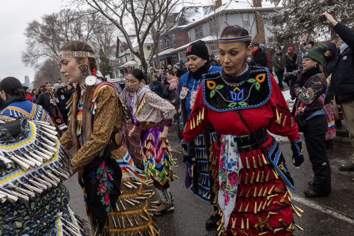American Indian Movement dancers dance at the site where Renee Nicole Good was shot and killed by a Federal agent, on February 1, 2026, on Portland Avenue in Minneapolis, Minnesota.Andrew Lichtenstein / Corbis via Getty Images