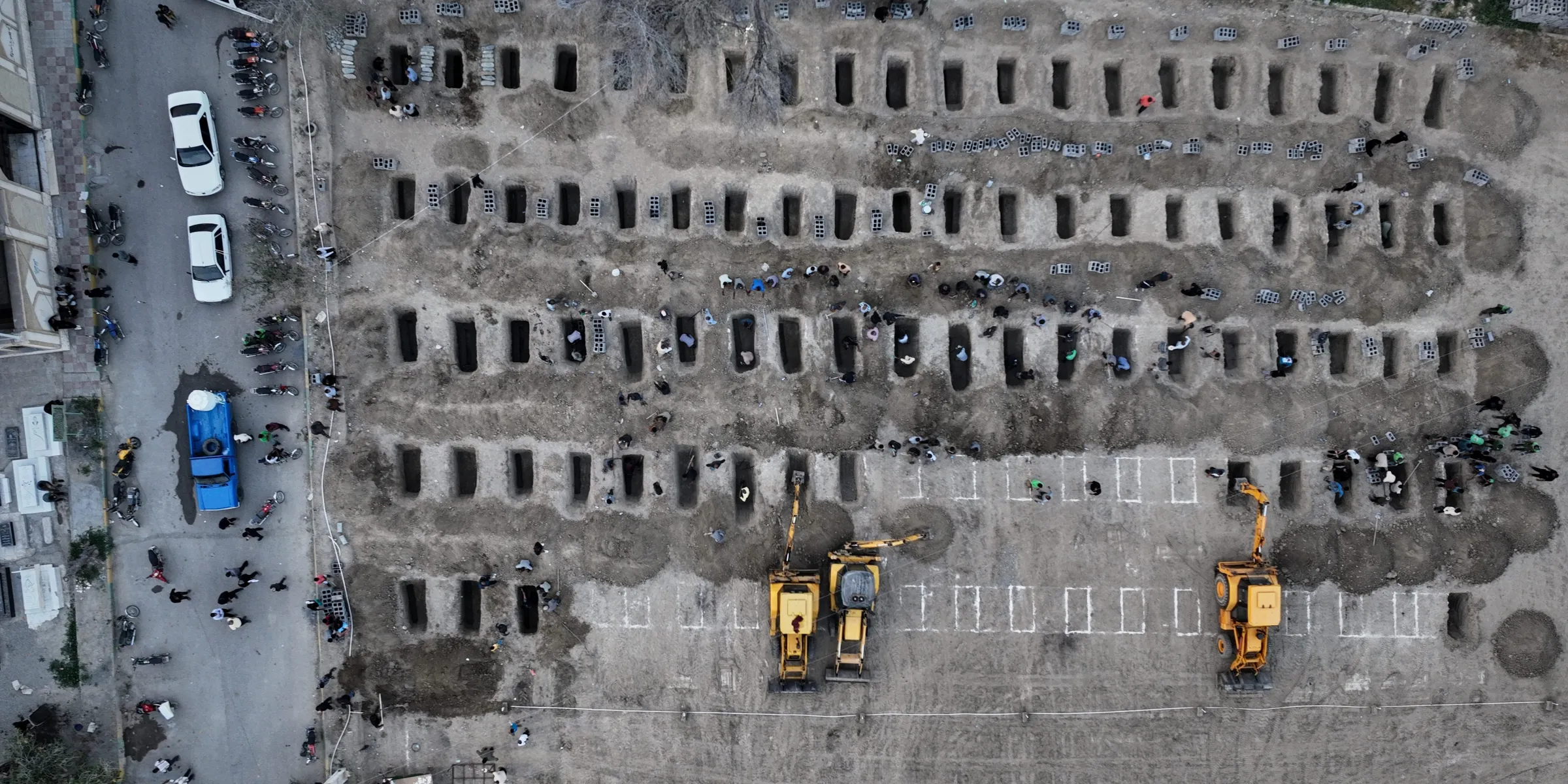 This photo, released by the Iranian government's foreign media department and distributed by the AP without changes, shows graves being prepared for the victims, mostly children, of a Feb. 28 Israeli–U.S. strike at a girls’ elementary school in Minab, Iran, seen on March 2, 2026. Photo: Iranian Foreign Media Department via AP