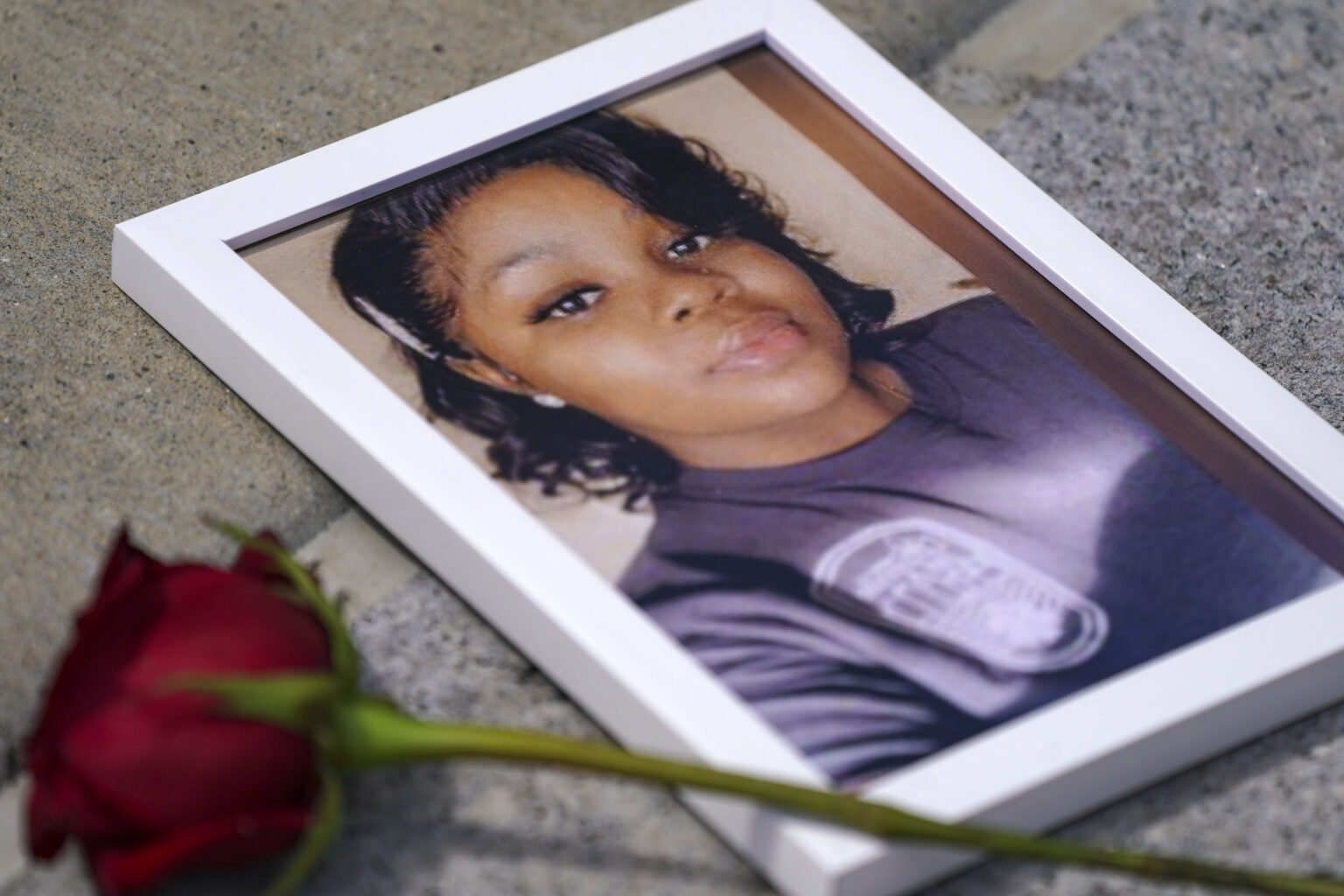 WASHINGTON, DC – JULY 30: A photo of Breonna Taylor is seen among other photos of women who have lost their lives as a result of violence during the 2nd Annual Defend Black Women March in Black Lives Matter Plaza on July 30, 2022 in Washington, DC. (Photo by Leigh Vogel/Getty Images for Frontline Action Hub)