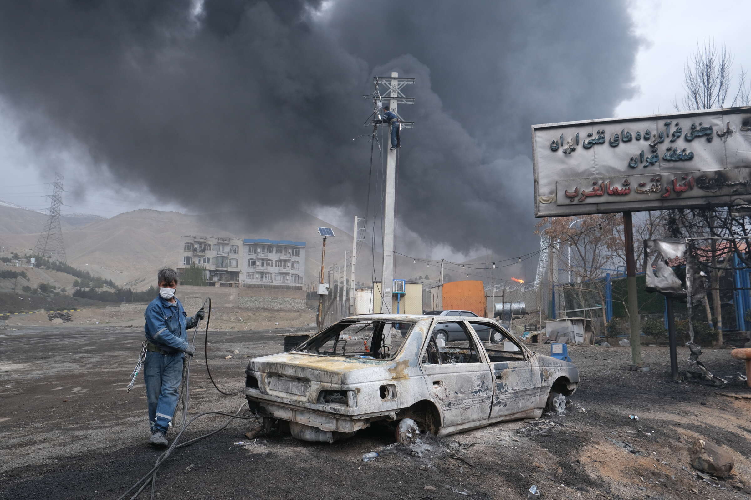 Plumes of smoke rise over the oil depot tanks hit by joint Israel-U.S. strikes over night in a station north west of the capital on March 8, 2026, in Tehran, Iran.Kaveh Kazemi / Getty Images